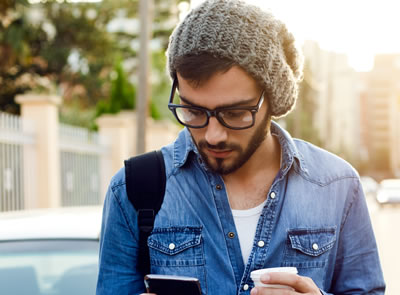 man looking at smartphone